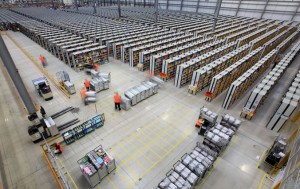 23/11/12...At first glance this new warehouse looks similar to any one of the seven giant Amazon depots in Britain. But take a closer look at the giant Fulfillment Centre - as it's called - and you'll notice that there isn't a single book anywhere in sight...The 700,000 sq. ft. site in Rugeley, Staffordshire, is however stuffed full of toys, games, and electronic equipment. ..Photographed here for the first time, the Rugeley site opened last September - the first one of the company's specialist fulfillment centres not to sell books. Staff there are working flat-out processing Christmas orders. The company has employed an extra 10,000 members of staff across Britain to cope with the surge in Christmas orders...At the Christmas 2011 peak, Amazon's UK fulfilment centres shipped over 2.1m units in one 24 hour period - a total of 1,124 tones of goods - which meant a delivery truck left a fulfillment centre once every two minutes and 45 seconds...Online retailers name today 'Black Friday' as it marks the beginning of the Christmas rush - which is expected to peak this year on December 3rd - 'Cyber Monday'...Amazon first went online in the UK in 1998 selling books. It soon became the world's largest bookstore before becoming the biggest online retailer when it began selling other items....All Rights Reserved - F Stop Press - T: +44 (0)1335 300098..Local copyright law applies to all print & online usage. Fees charged will comply with standard space rates and usage for that country, region or state...